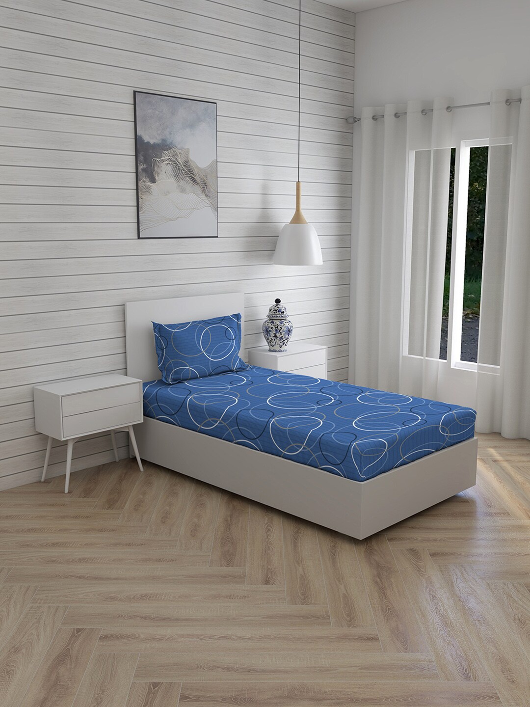 

Layers Blue & White Geometric 144 TC Single Bedsheet with 1 Pillow Cover