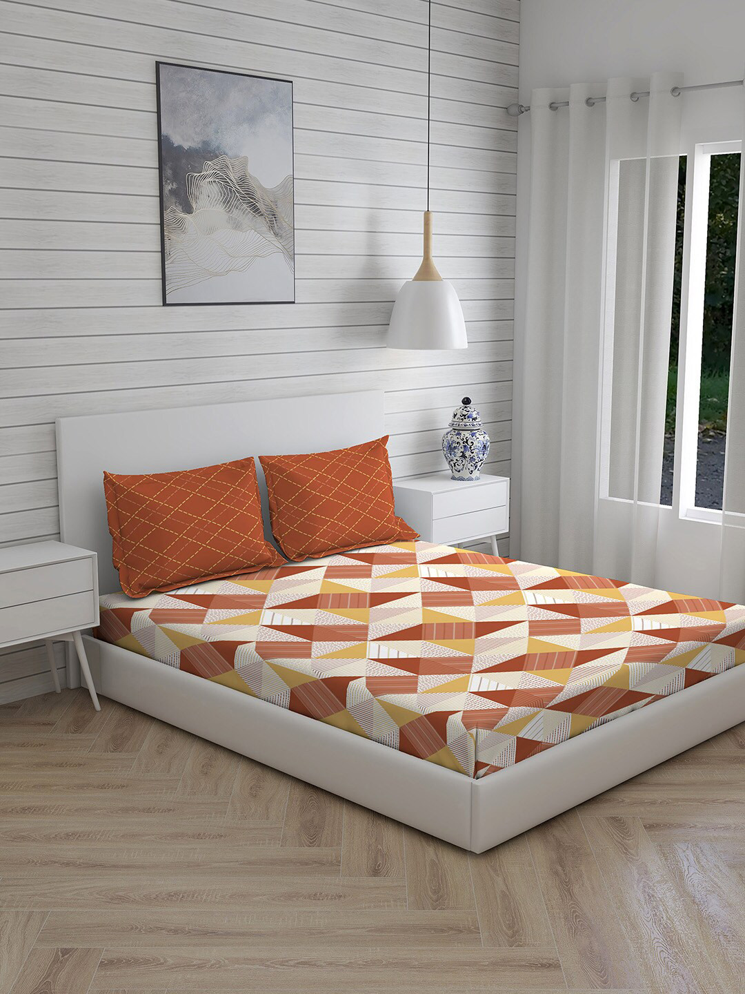 

Layers Brown & Yellow Geometric 104 TC King Bedsheet with 2 Pillow Covers
