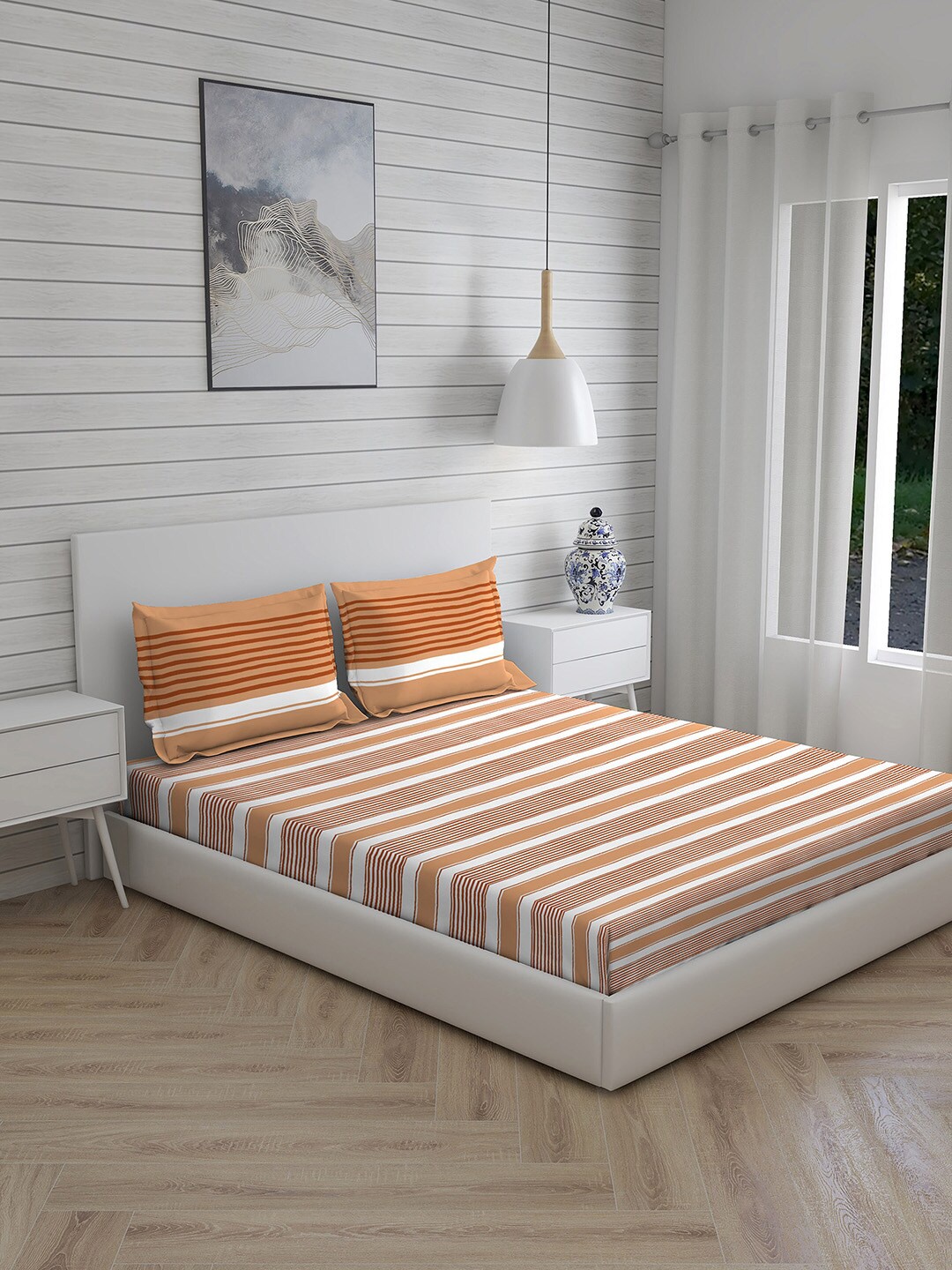 

Layers Orange & White Striped 104 TC King Bedsheet with 2 Pillow Covers