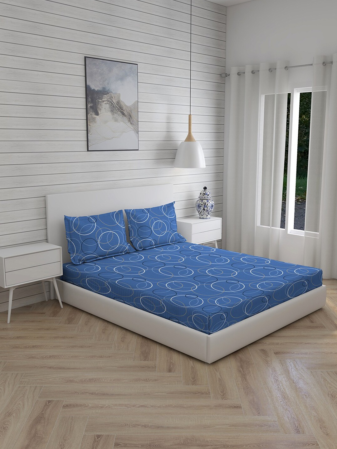 

Layers Blue & White Geometric 144 TC King Bedsheet with 2 Pillow Covers