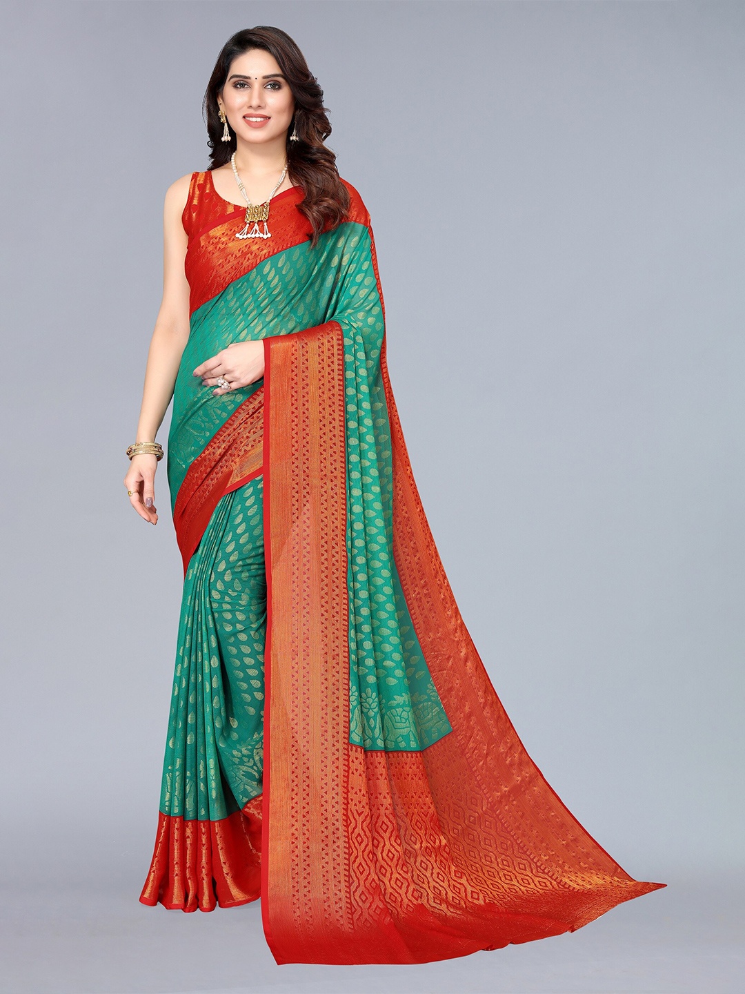 

Winza Designer Teal Green And Red Woven Design Zari Pure Chiffon Saree