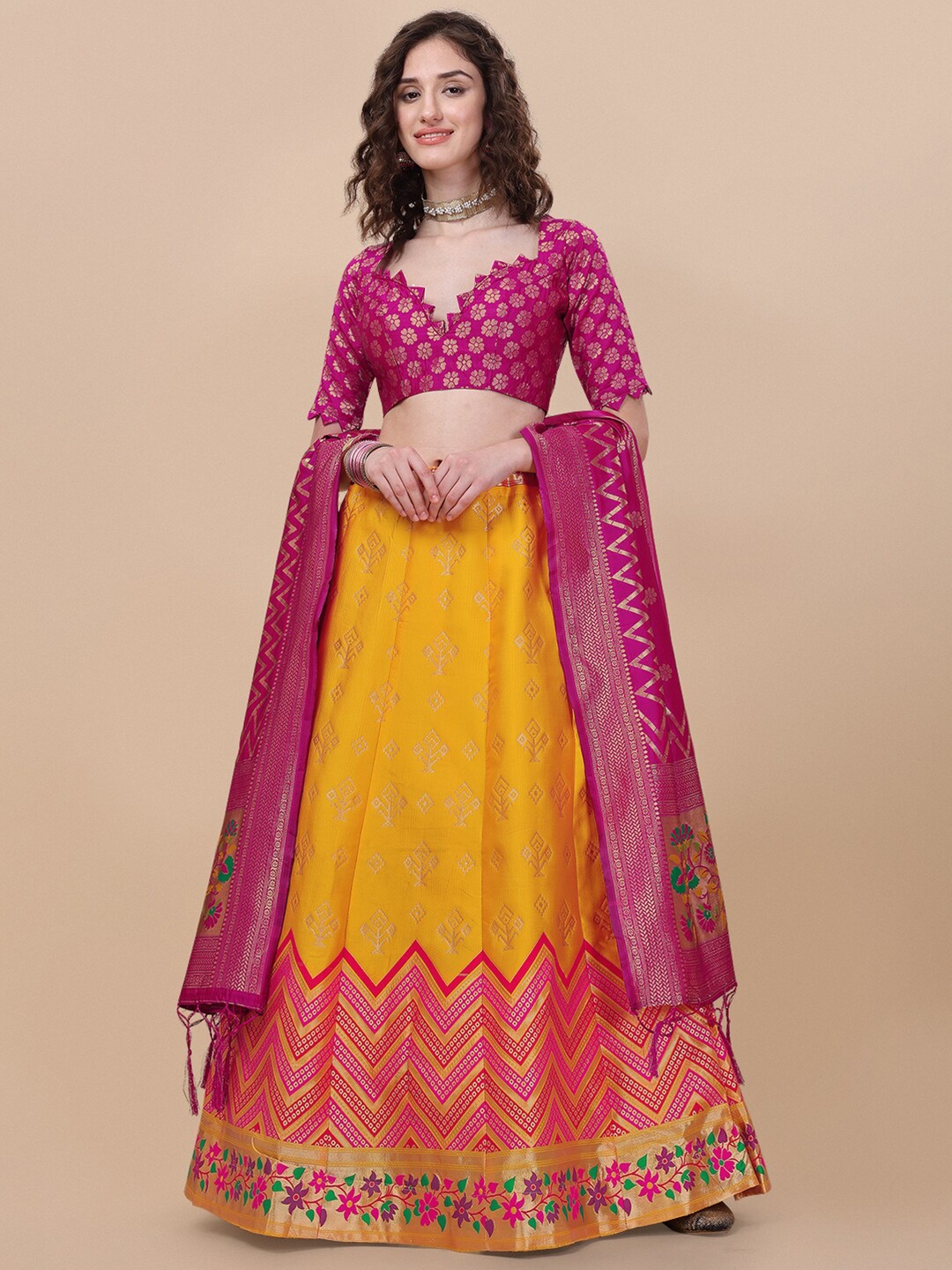 

Vaidehi Fashion Yellow & Pink Banarasi Silk Semi-Stitched Lehenga Choli