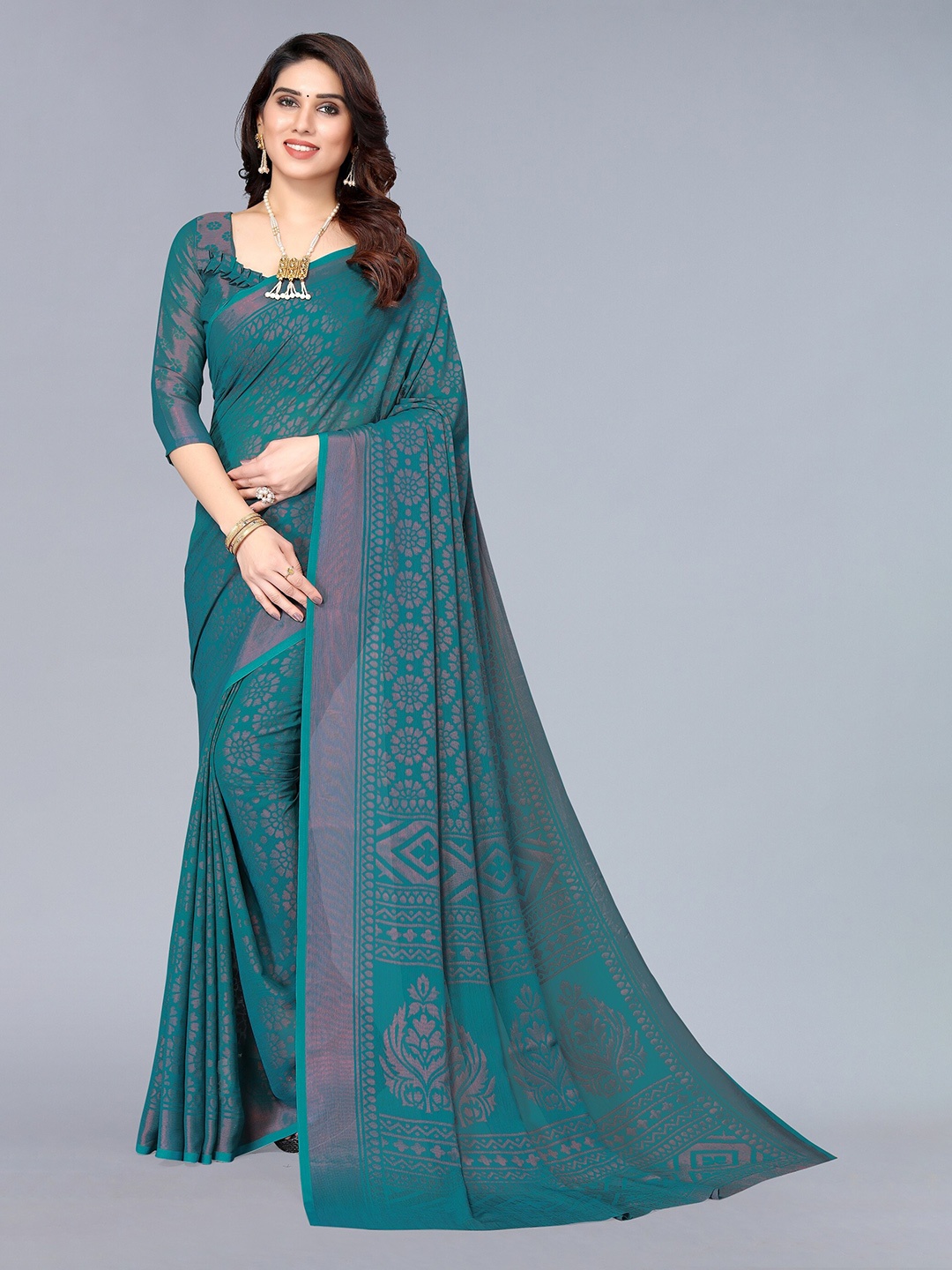 

Winza Designer Teal Floral Pure Chiffon Saree