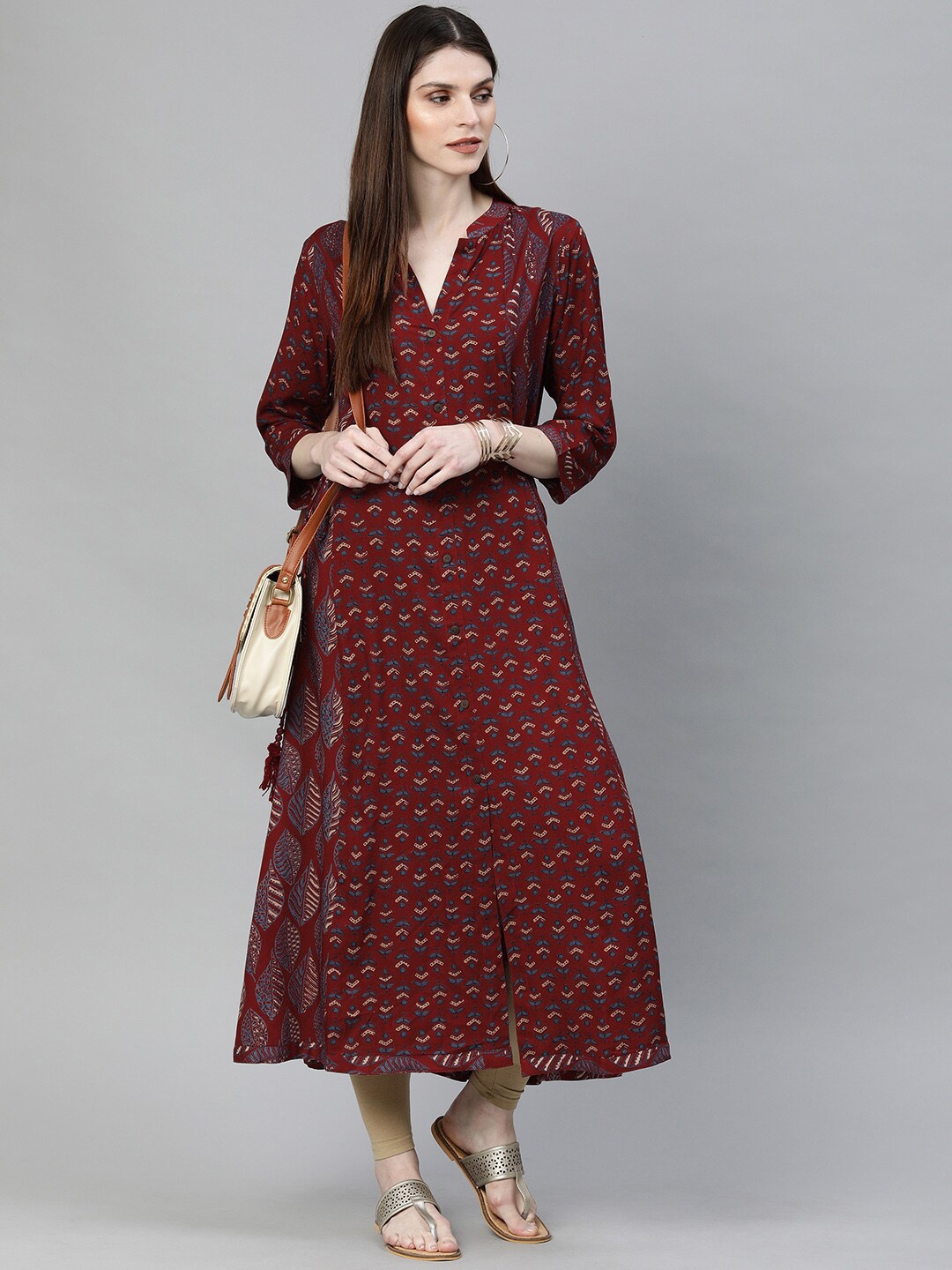 

Divena Women Plus Size Maroon And Blue Ethnic Motifs Printed Front Slit A Line Kurta