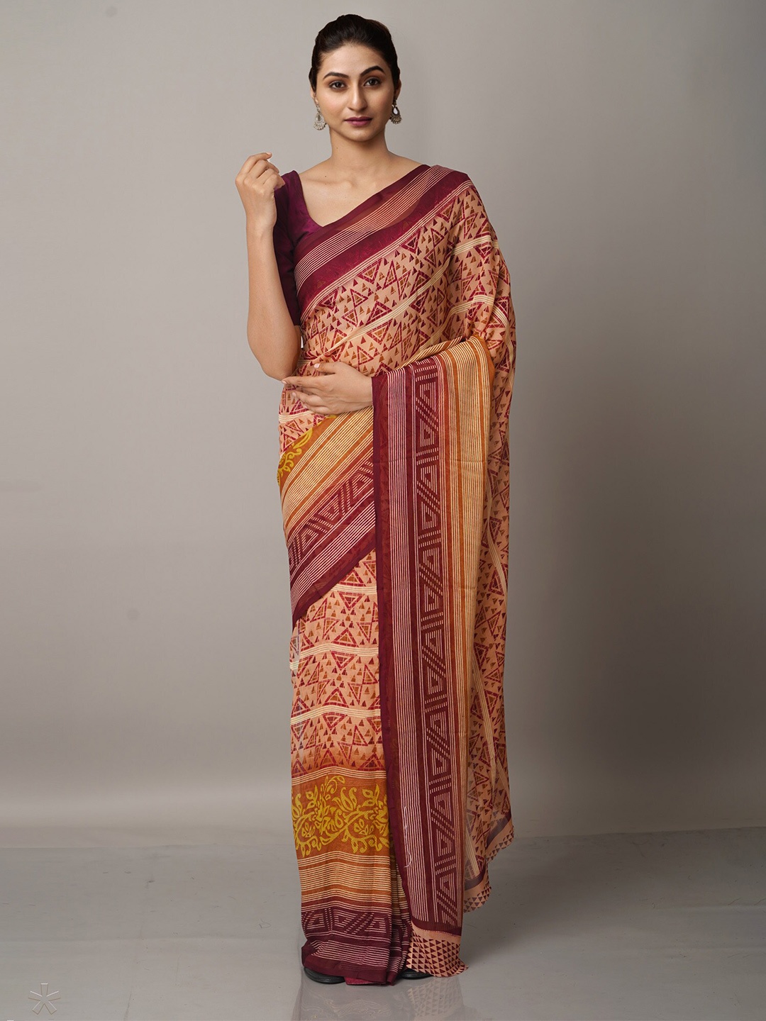 

Unnati Silks Brown & Mustard Block Print Saree