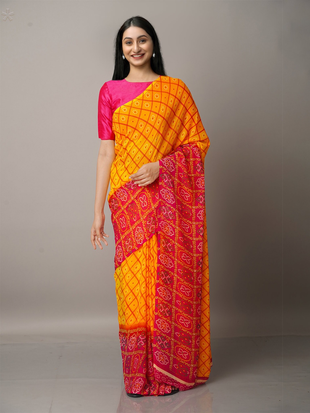 

Unnati Silks Yellow & Orange Ethnic Motif Block Print Saree