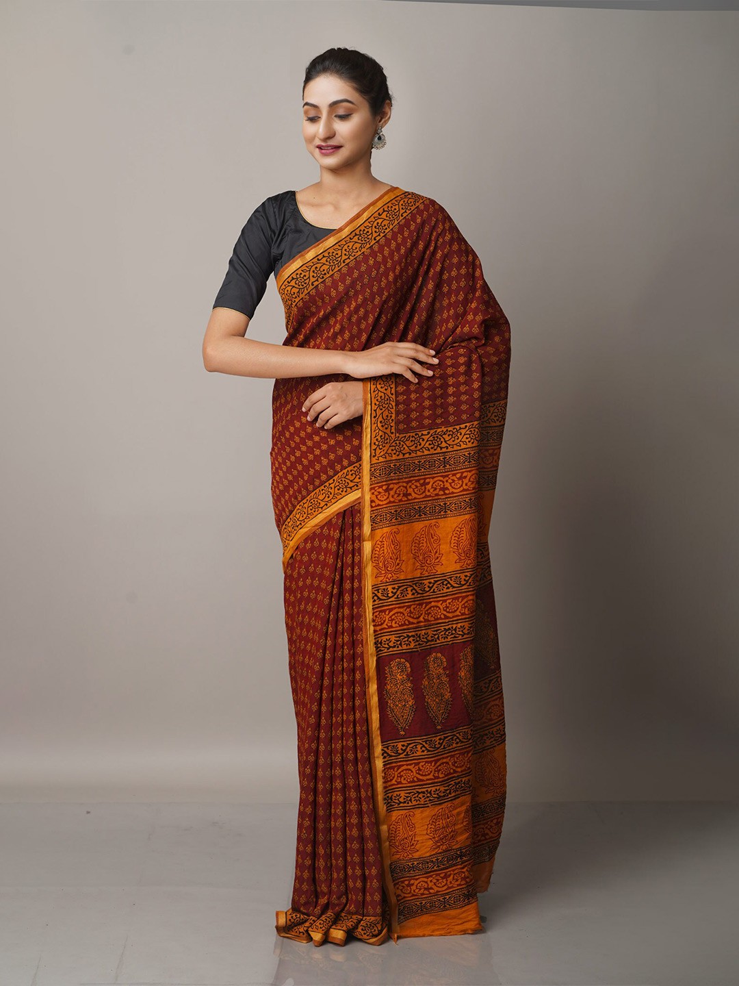 

Unnati Silks Brown & Yellow Bagh Zari Chanderi Saree