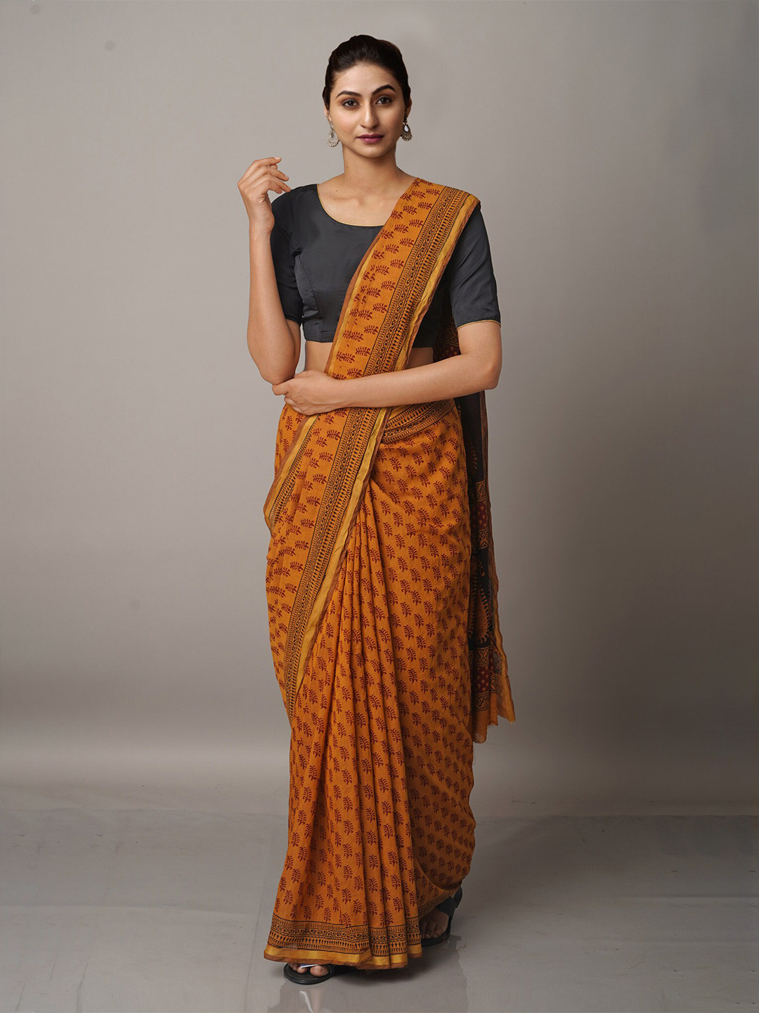 

Unnati Silks Rust & Black Ethnic Motifs Chanderi Saree