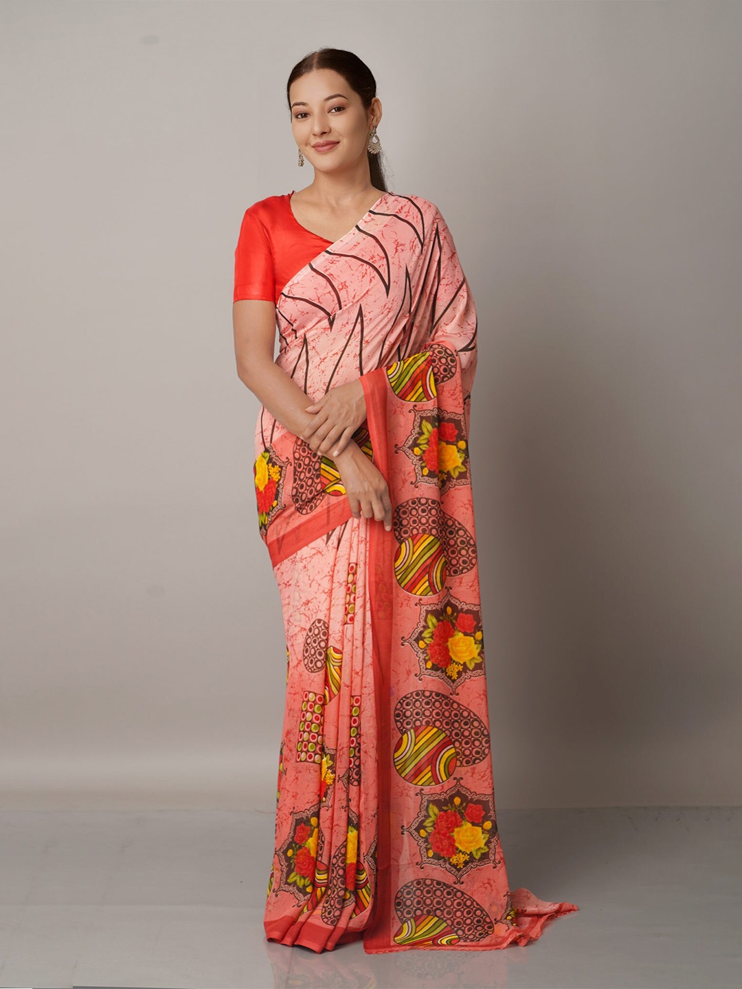 

Unnati Silks Pink & Green Ethnic Motifs Block Print Georgette Saree