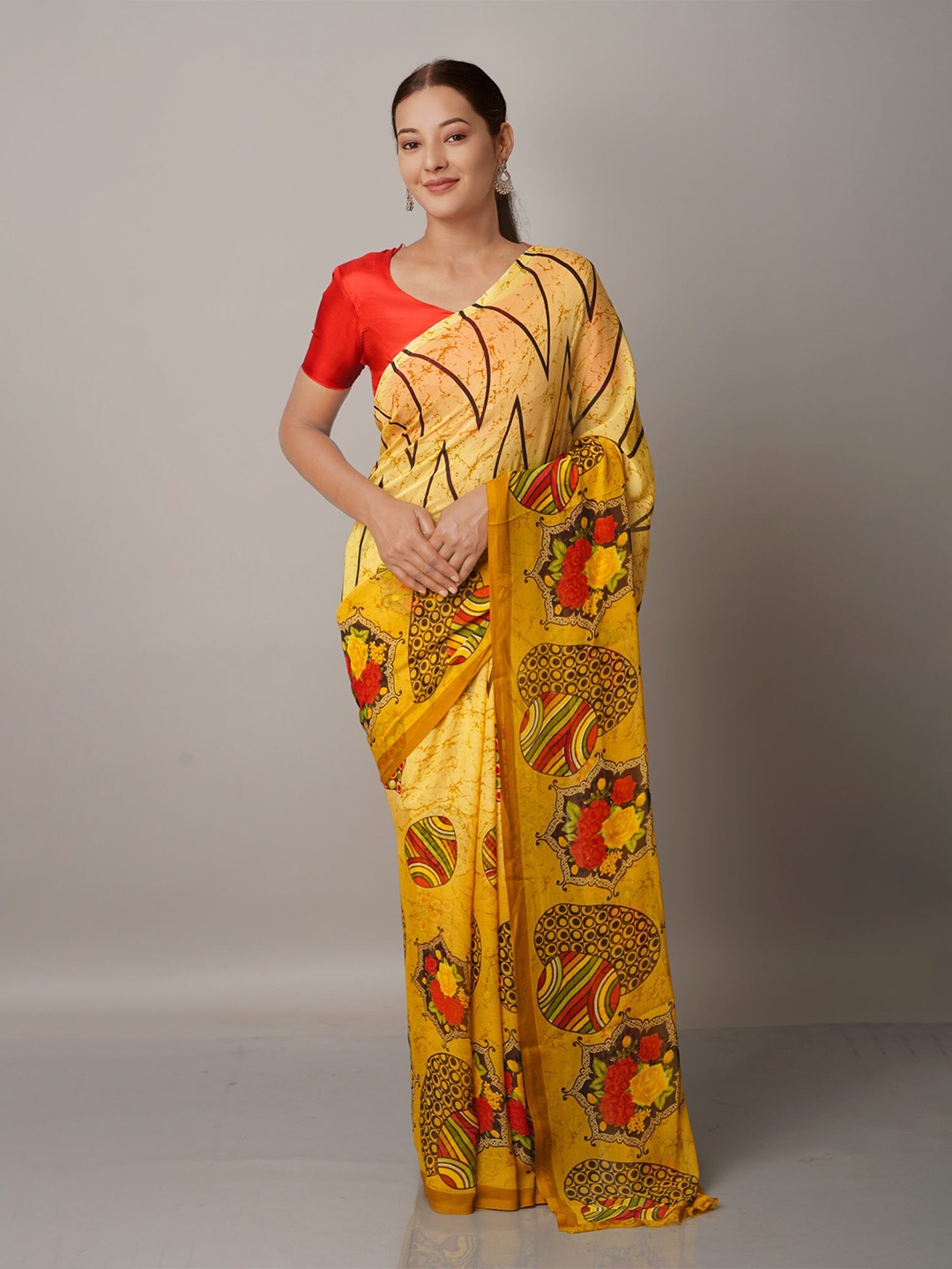 

Unnati Silks Orange & Green Floral Block Print Saree