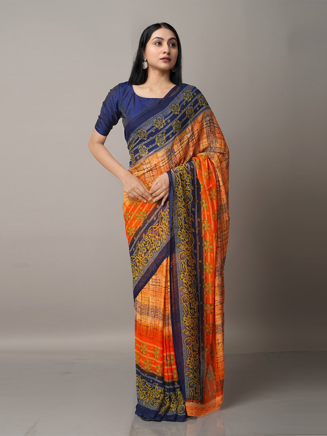 

Unnati Silks Orange & Blue Tie and Dye Block Print Saree