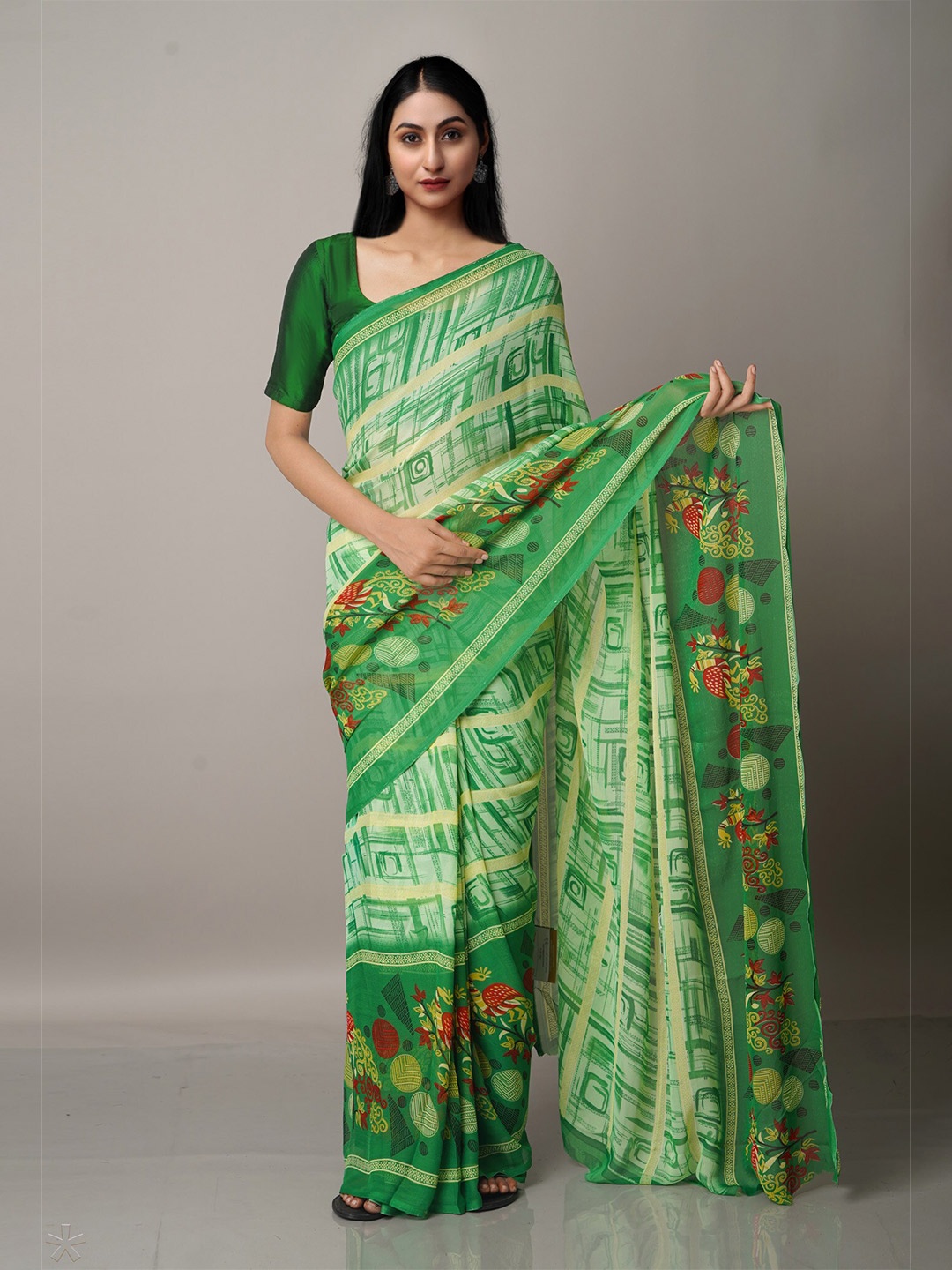 

Unnati Silks Green & Red Tie and Dye Block Print Saree