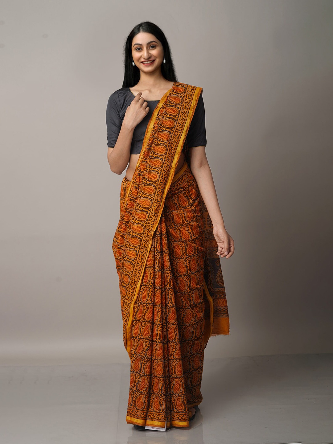 

Unnati Silks Brown And Gold Toned Bagh Print Zari Chanderi Saree