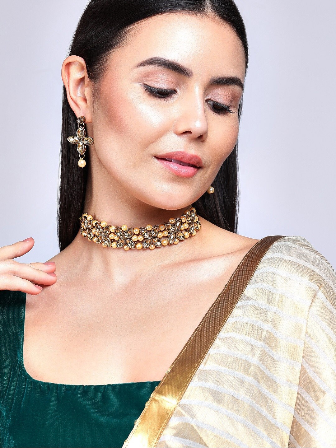 

Anouk Gold-Plated & Toned Cream Kundan Studded & Beaded Jewellery Set