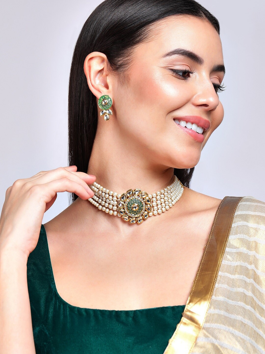 

Anouk Gold-Plated & Golden-Coloured Kundan-Studded Jewellery Set