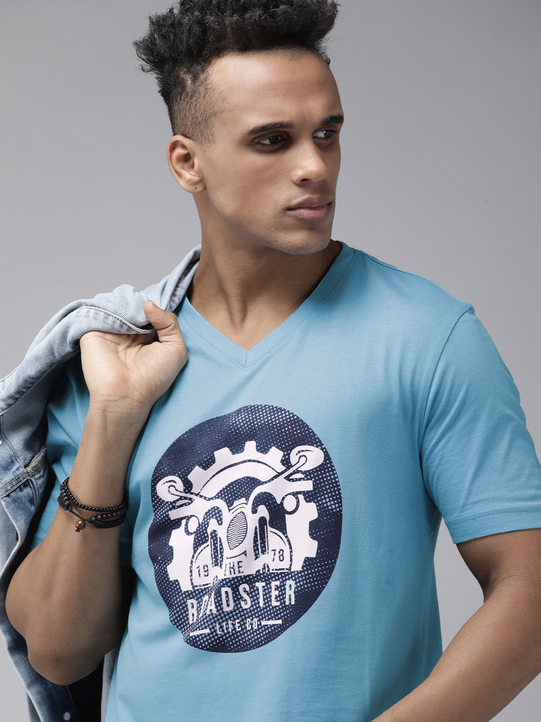 

Roadster Men Blue & White Brand Logo Printed V-Neck Pure Cotton T-shirt