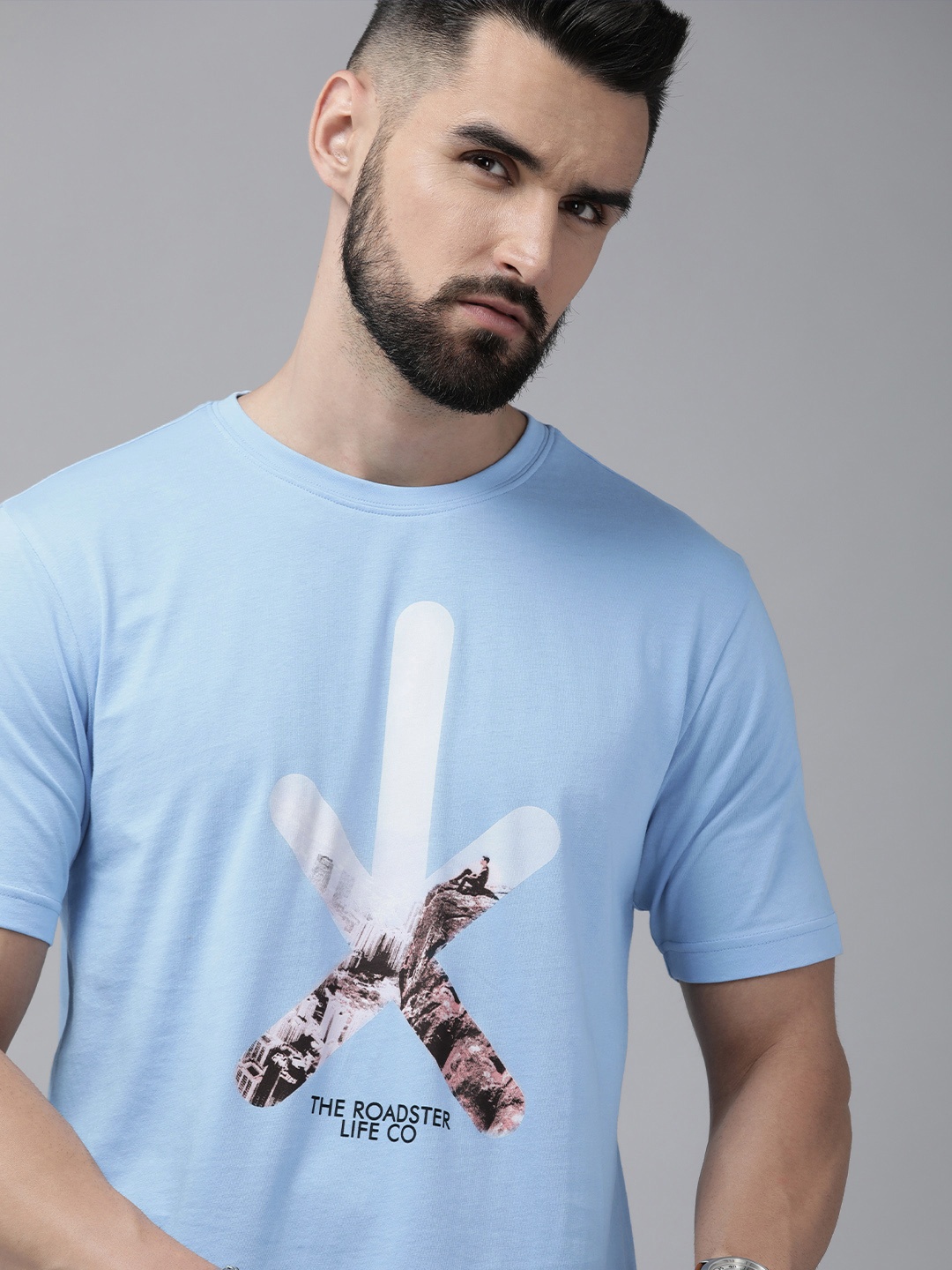 

Roadster Men Blue & White Brand Logo Printed Pure Cotton T-shirt