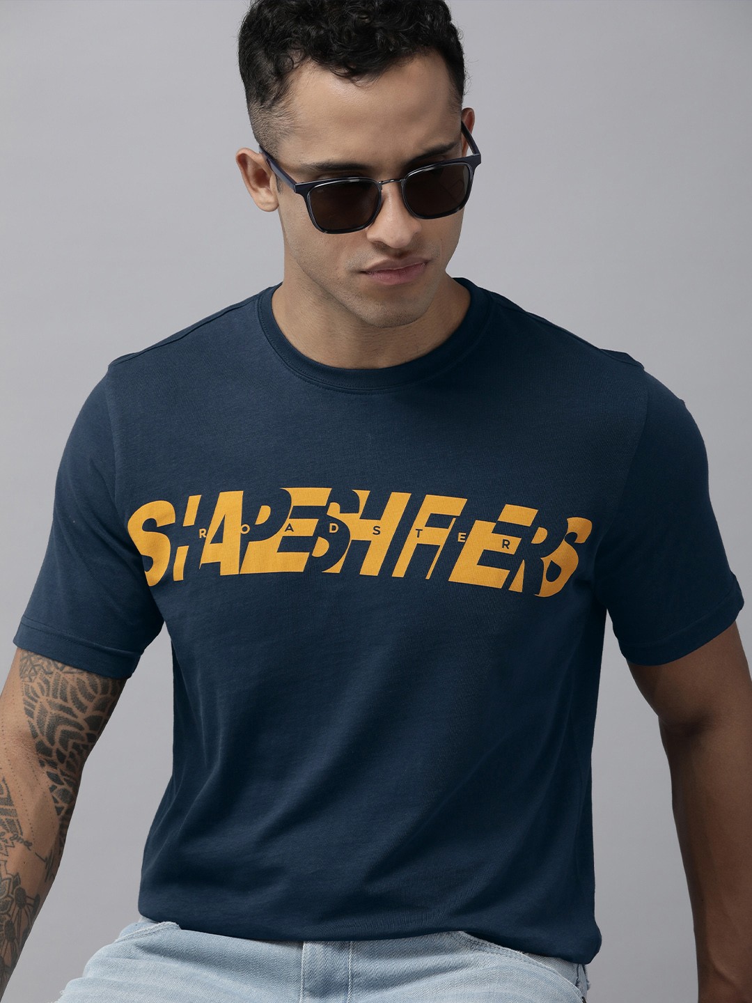

Roadster Men Navy Blue & Mustard Yellow Typography Printed Pure Cotton T-shirt