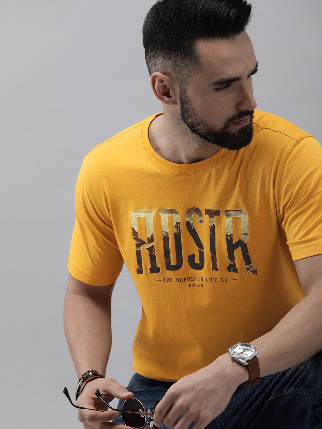 

Roadster Men Mustard Yellow & Black Brand Logo Printed Pure Cotton T-shirt