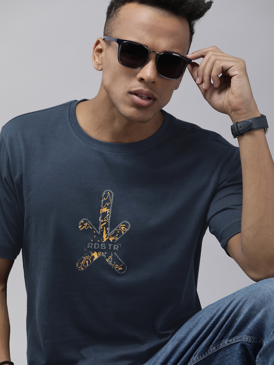 

Roadster Men Navy Blue & Yellow Pure Cotton Brand Logo Printed T-shirt