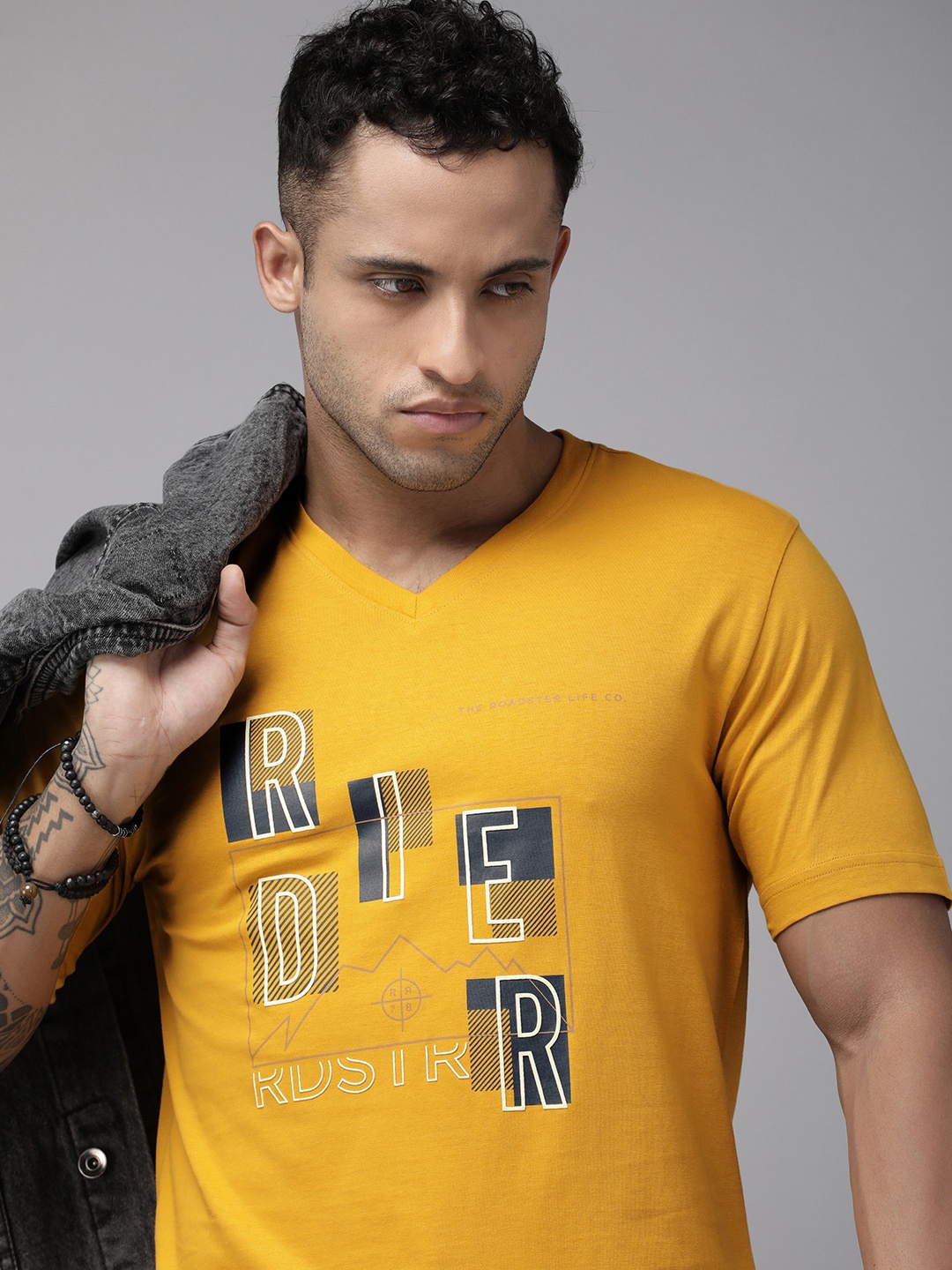 

Roadster Men Yellow Typography Printed V-Neck Pure Cotton T-shirt