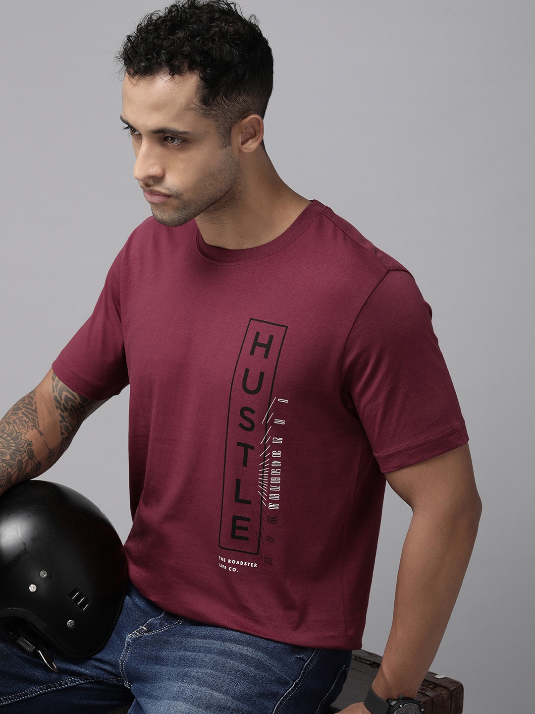 

Roadster Men Burgundy & Black Typography Printed Pure Cotton T-shirt