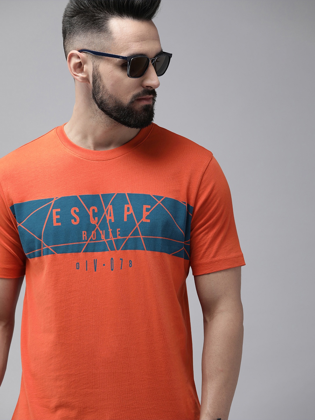 

Roadster Men Orange & Blue Typography Printed Pure Cotton T-shirt