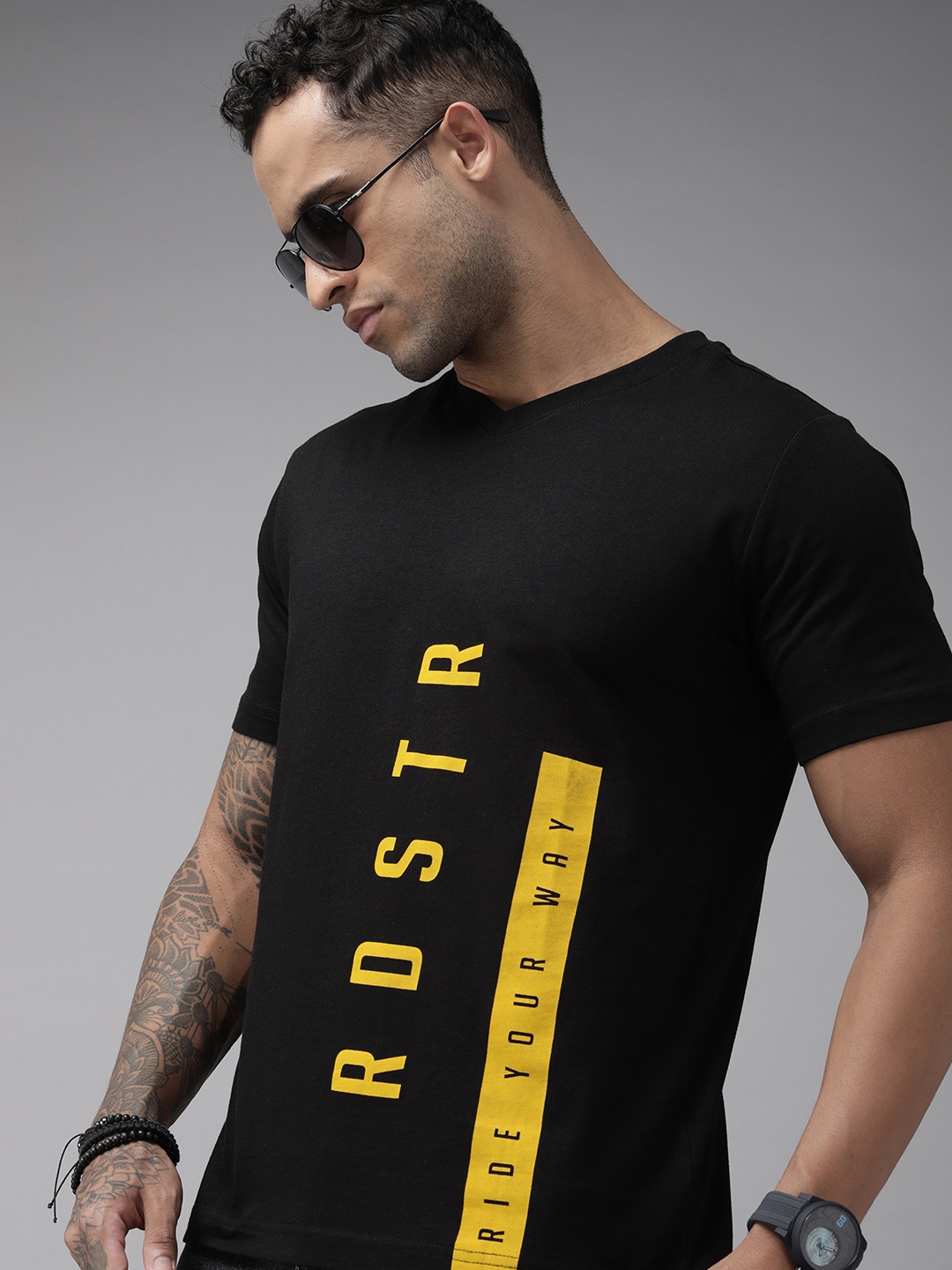 

Roadster Men Black Typography Printed V-Neck Pure Cotton T-shirt