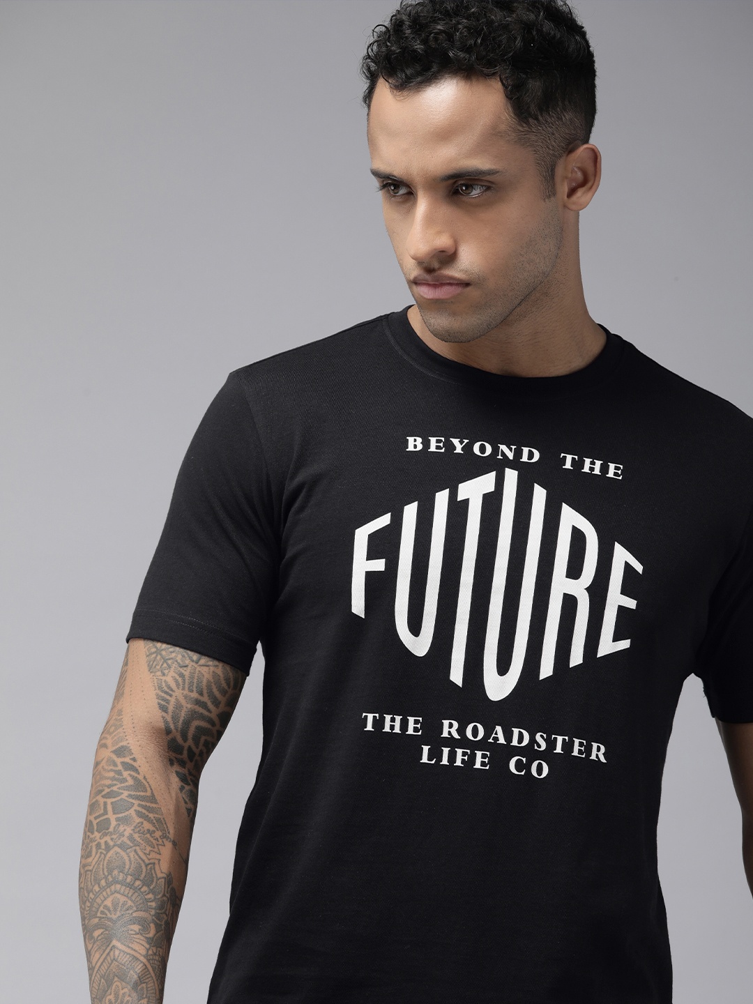 

Roadster Men Black & White Pure Cotton Typography Printed T-shirt