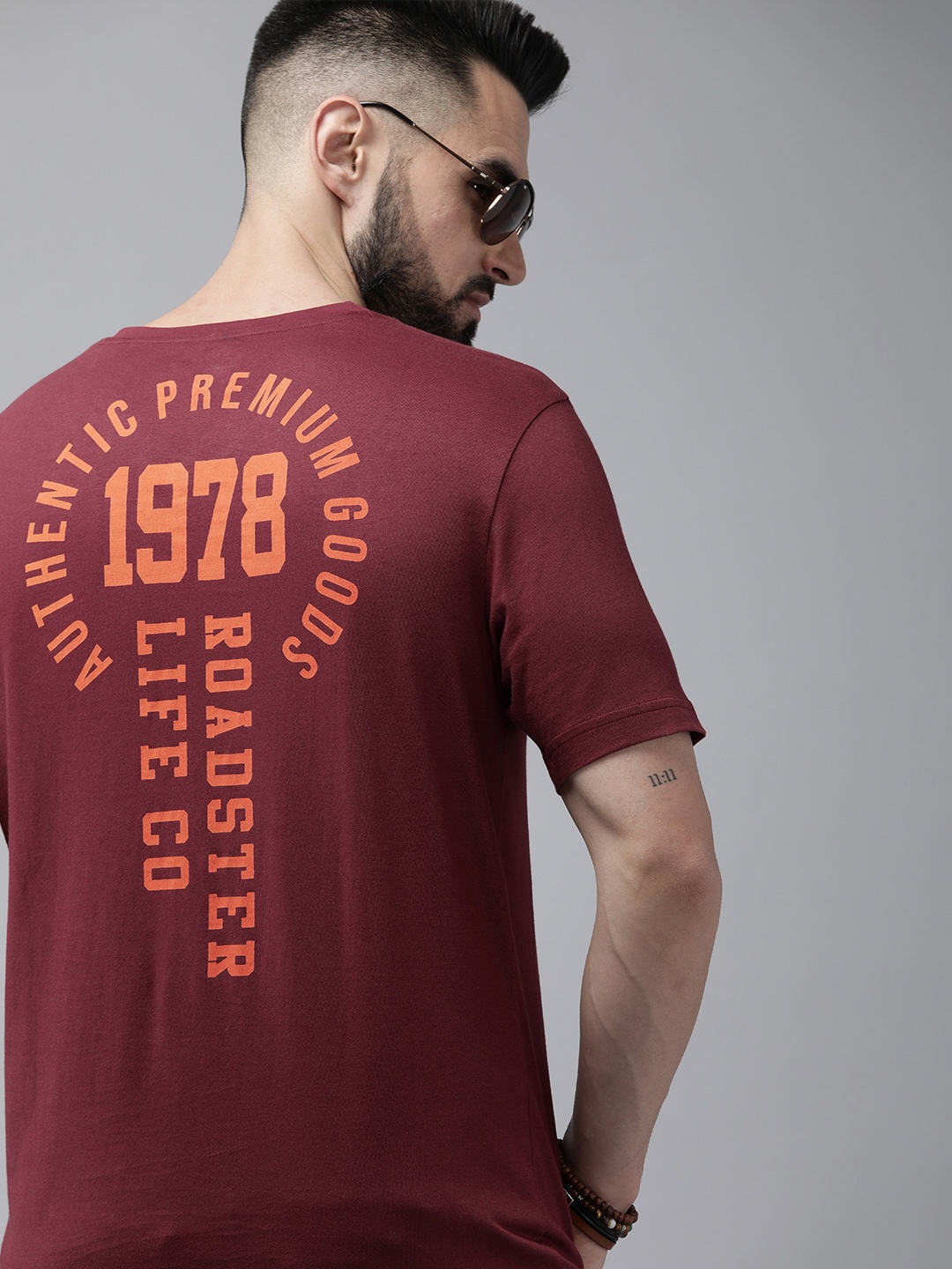 

Roadster Men Burgundy & Orange Typography Printed V-Neck Pure Cotton T-shirt