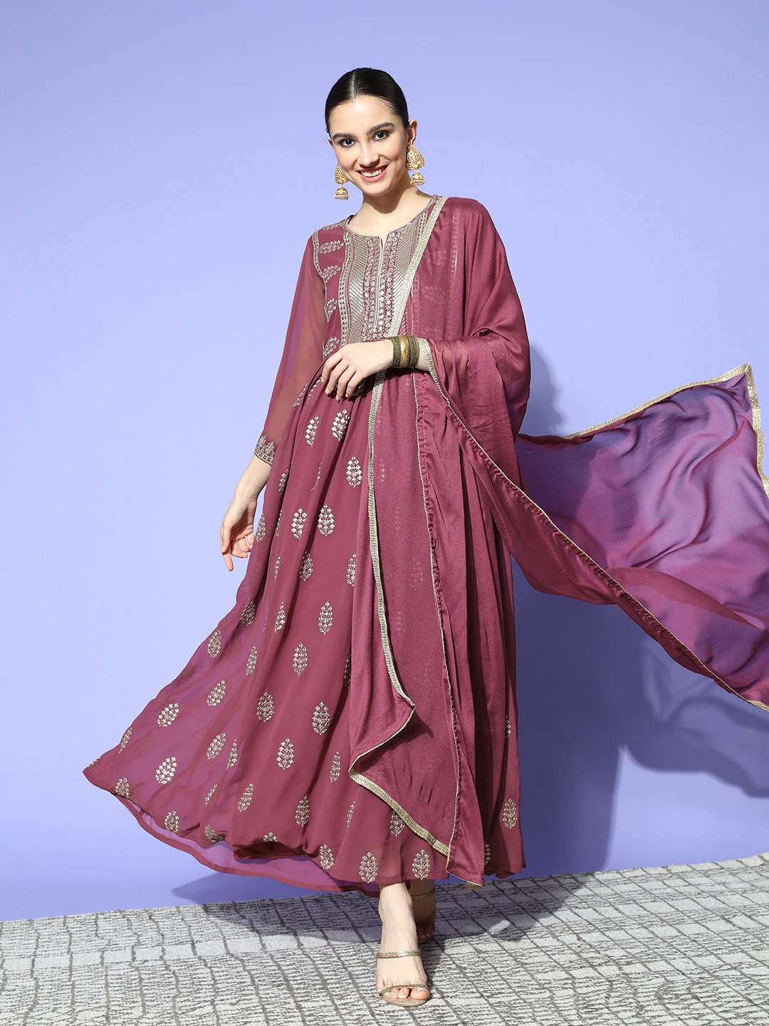 

Sunehri Women Lovely Maroon Georgette Volume Control Ethnic Dress