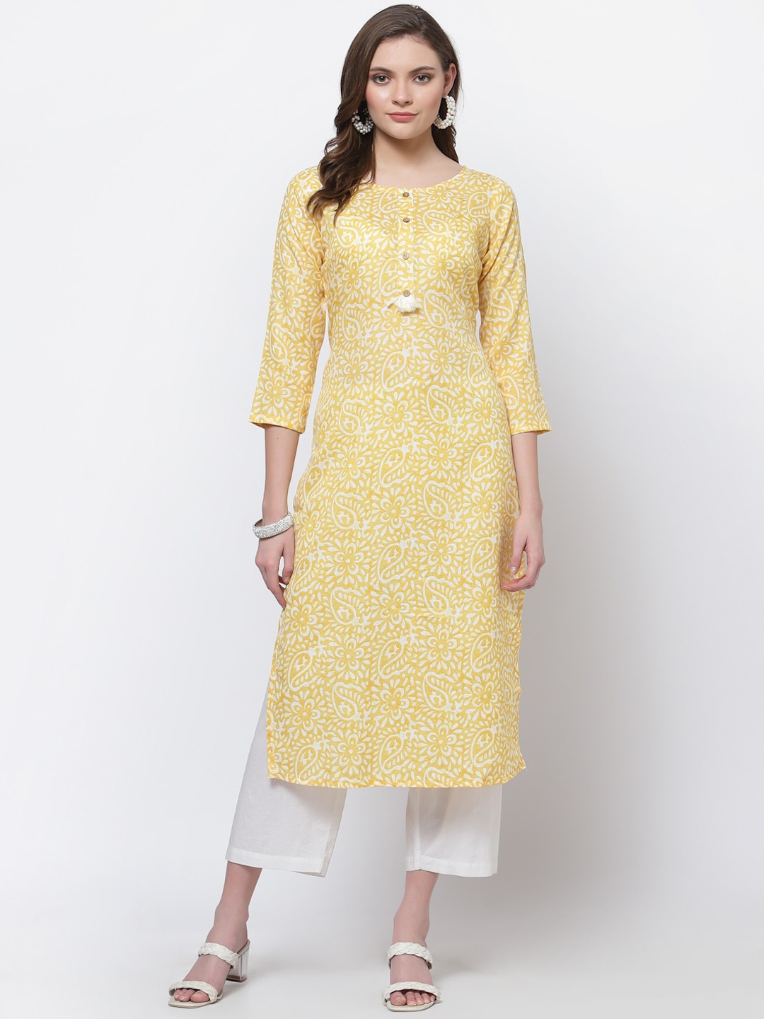 

Anuthi Women Yellow Printed Cotton Straight Kurta