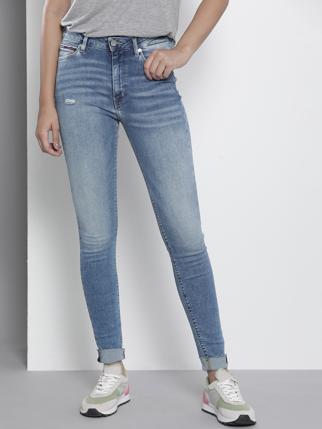 

Tommy Hilfiger Women Blue Super Skinny Fit High-Rise Low Distress Light Fade Stretchable Jeans