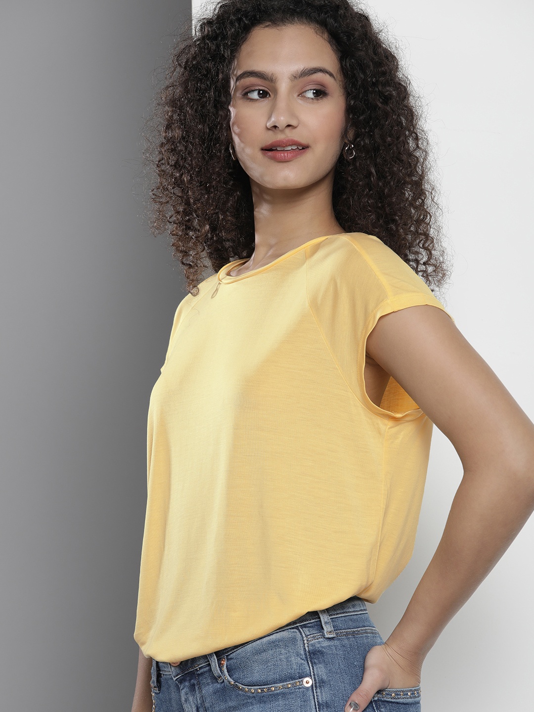 

Tommy Hilfiger Women Yellow Solid Round-Neck Top