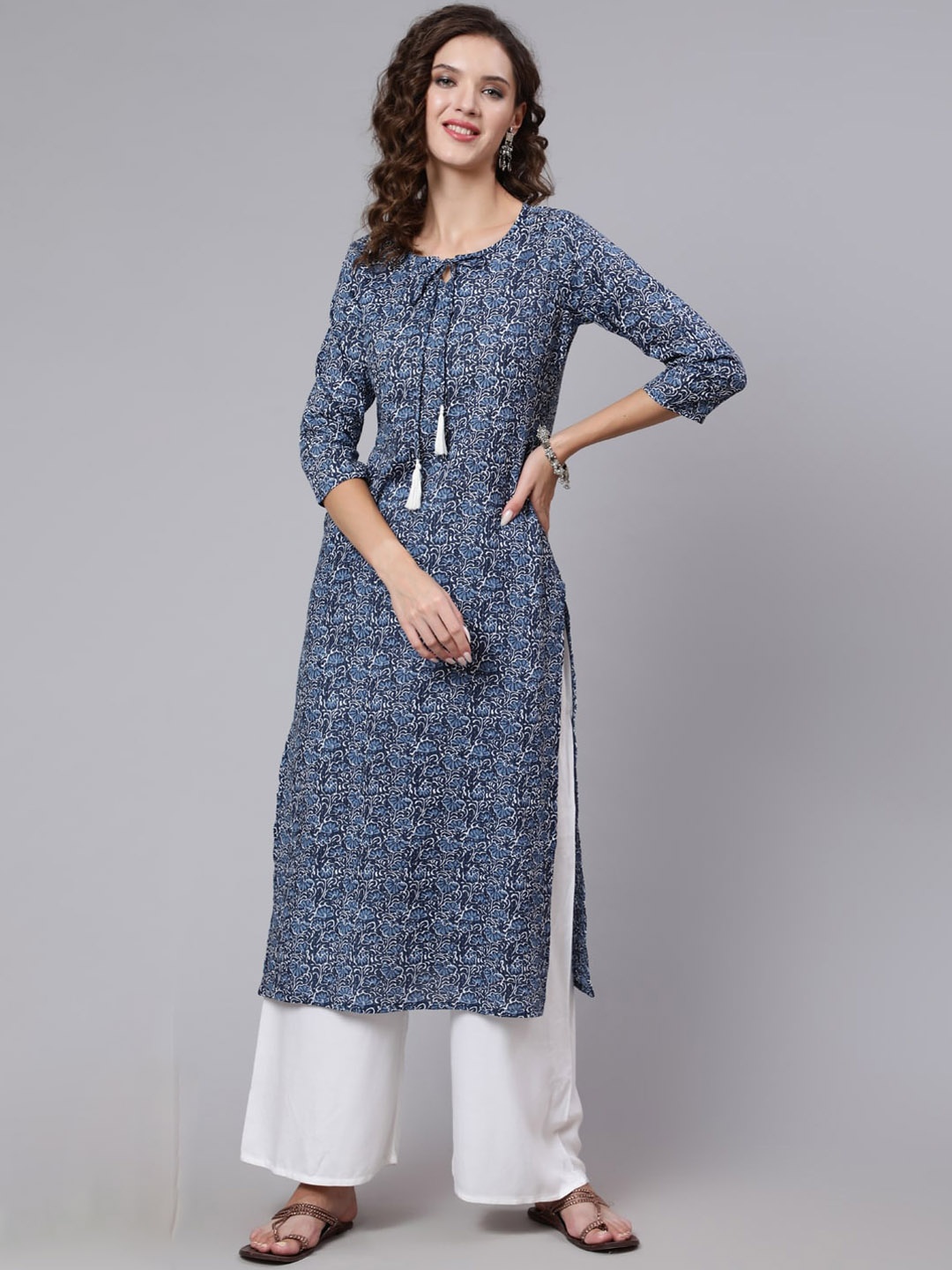 

Nayo Women Blue Printed Keyhole Neck Three-Quarter Sleeves Straight Kurta