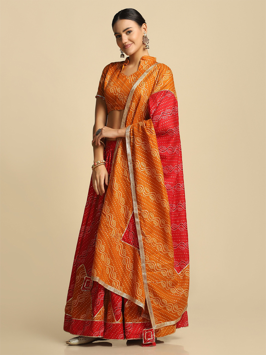 

Atsevam Women Red & Yellow Printed Semi-Stitched Lehenga & Unstitched Blouse With Dupatta