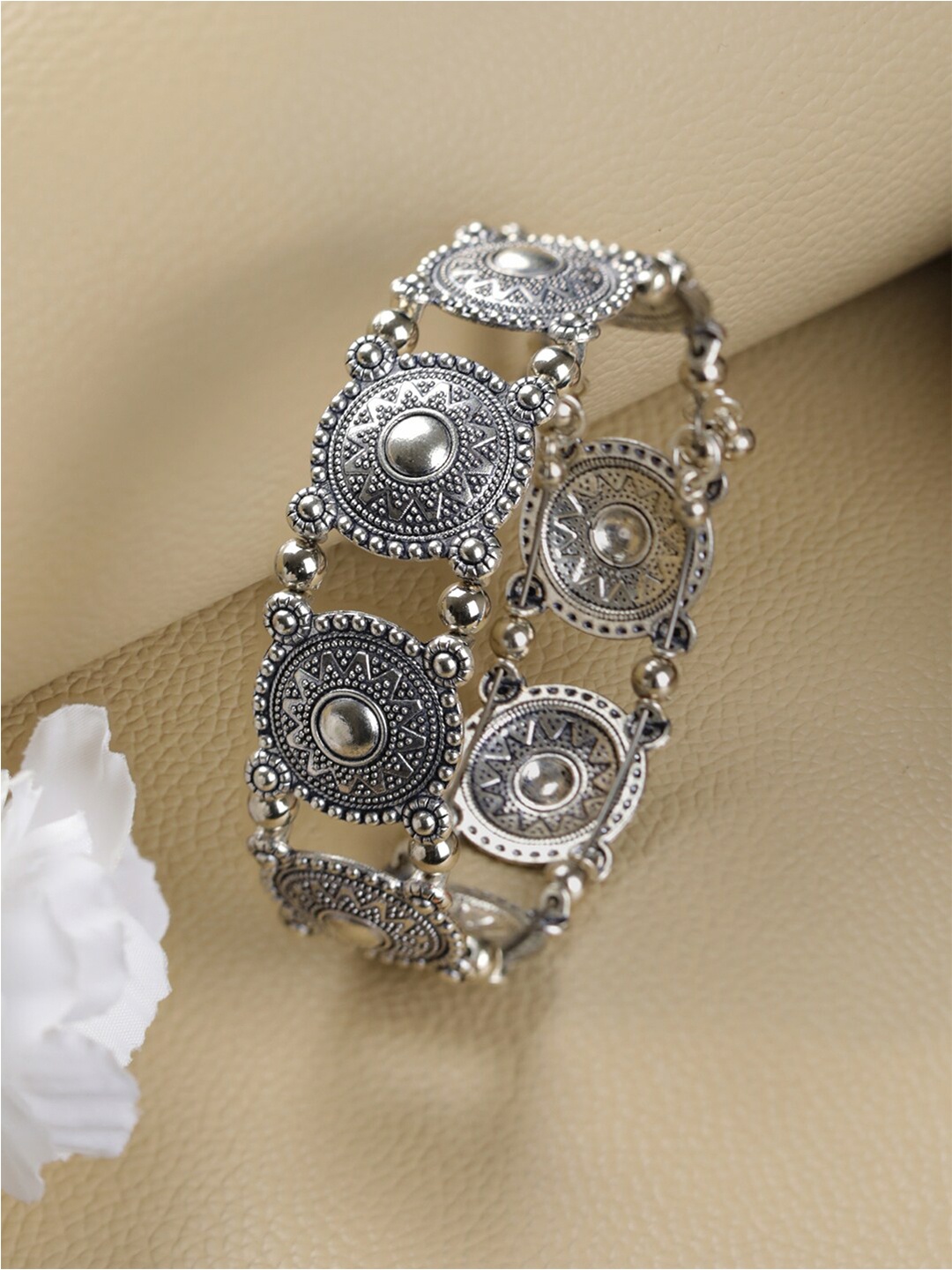 

Jazz and Sizzle Women Silver-Toned Brass Silver-Plated Bangle-Style Bracelet