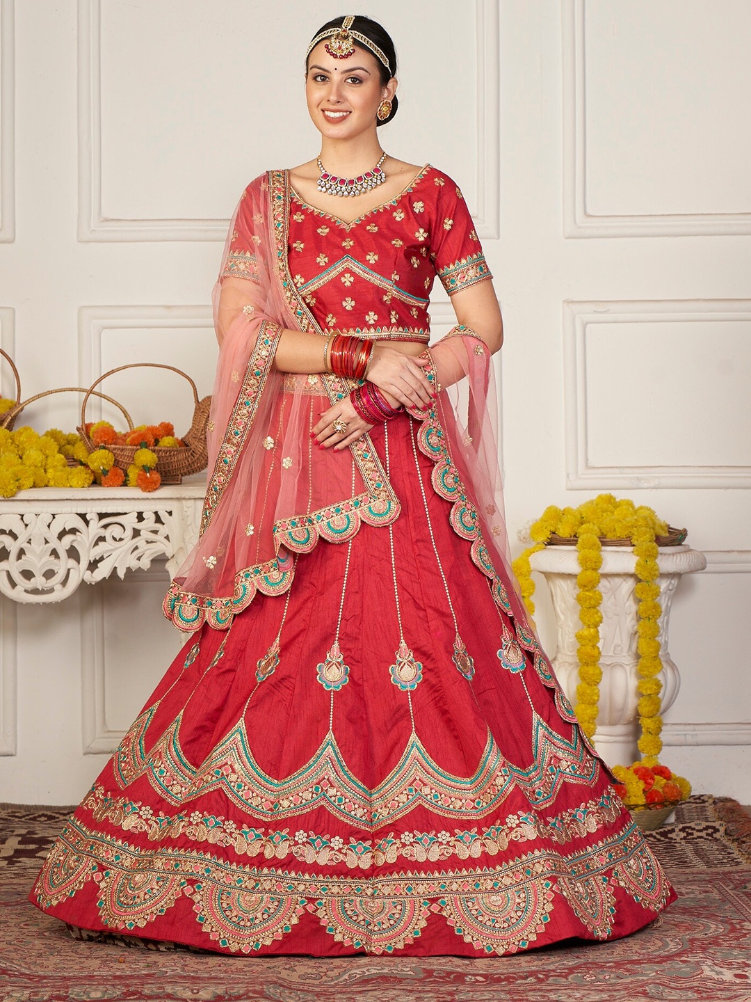 

Atsevam Maroon & Gold-Toned Embroidered Semi-Stitched Lehenga Choli