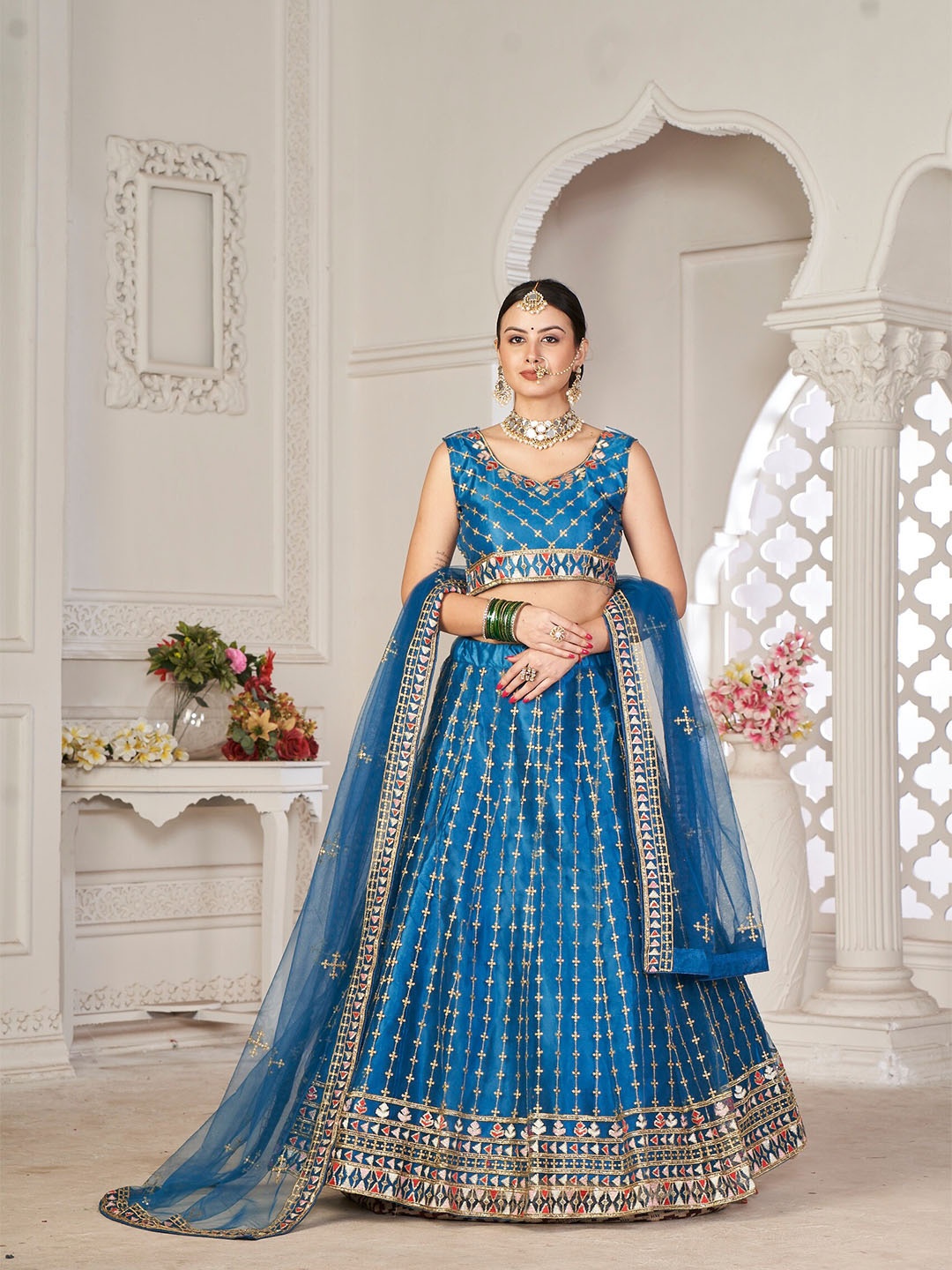 

Atsevam Turquoise Blue Embroidered Thread Work Tie and Dye Semi-Stitched Lehenga & Unstitched Blouse With