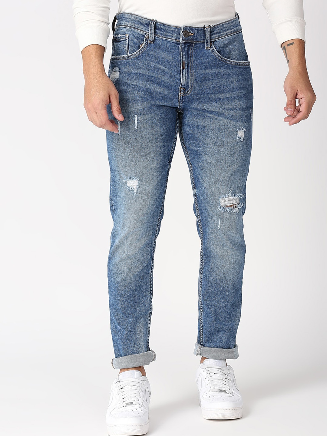 

LOVEGEN Men Blue Skinny Fit Mildly Distressed Heavy Fade Stretchable Jeans