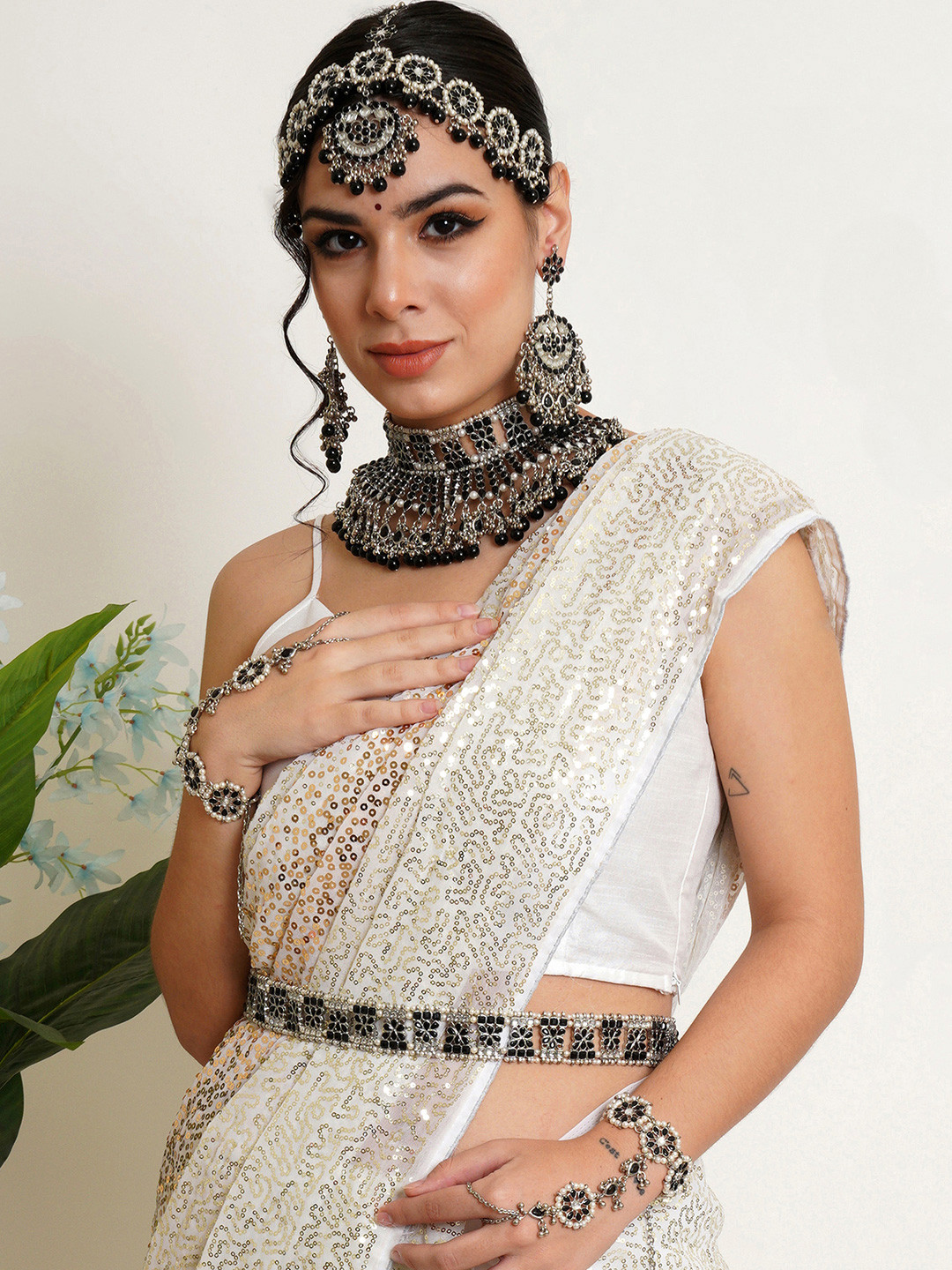 

KARATCART Silver-Plated Black Kundan-Studded & Beaded Jewellery Set