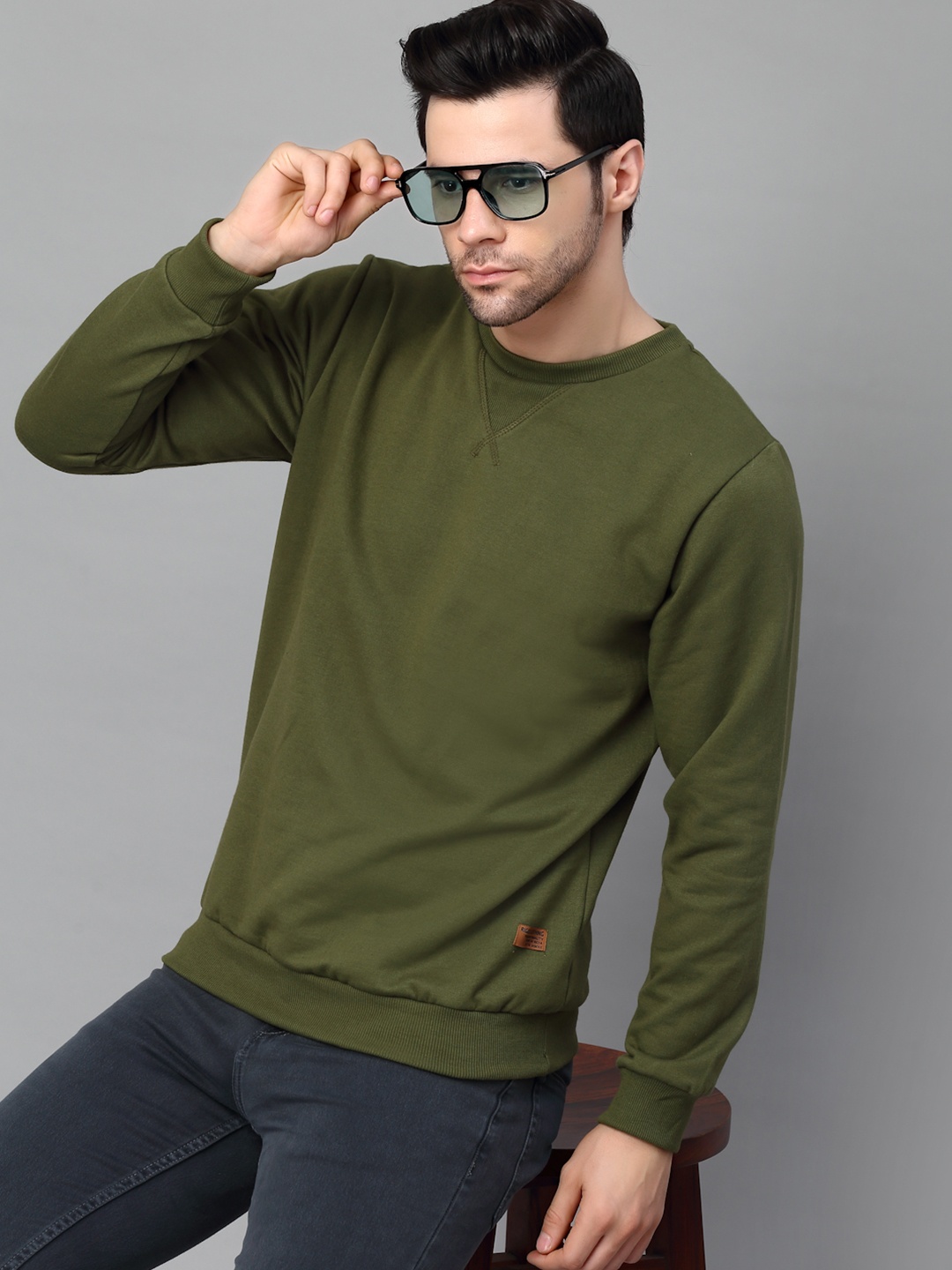 

Rigo Men Green Solid Sweatshirt