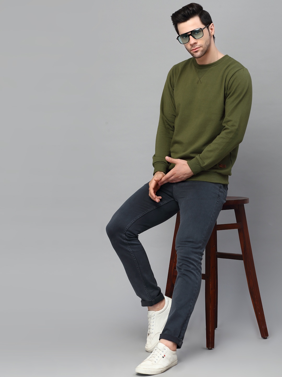 

Rigo Men Green Solid Sweatshirt