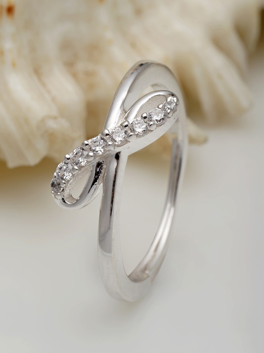 

KUNUZ Silver-Plated Loop Shape CZ studded Stones Ring