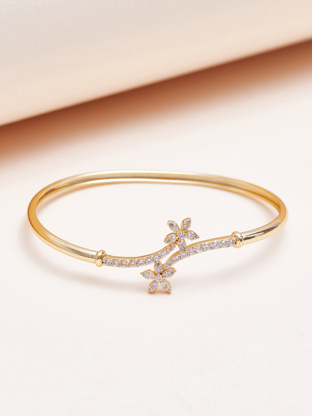 

Voylla Women Tiny Flower Design Brass Cubic Zirconia Gold-Plated Bangle-Style Bracelet