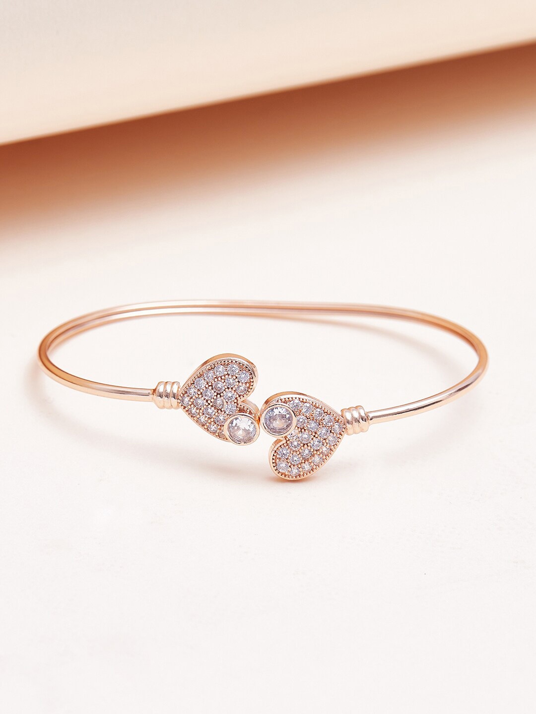 

Voylla Women Heart Design Brass Cubic Zirconia Rose Gold-Plated Bangle-Style Bracelet