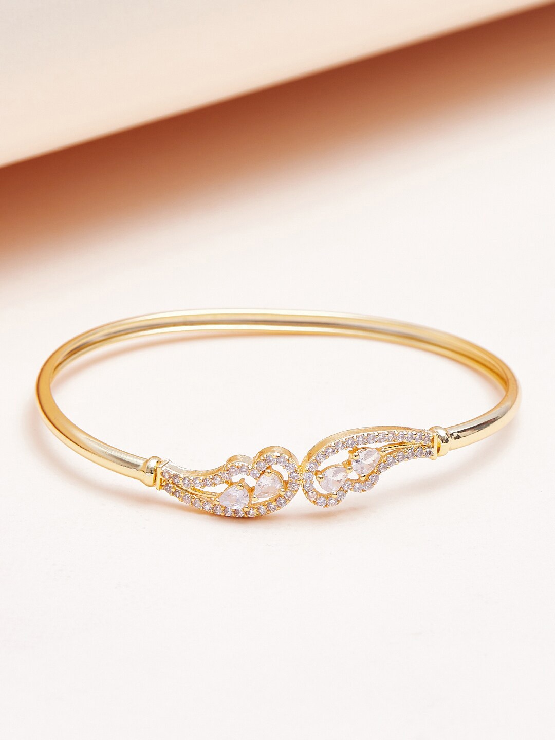 

Voylla Women Brass Cubic Zirconia Gold-Plated Bangle-Style Bracelet