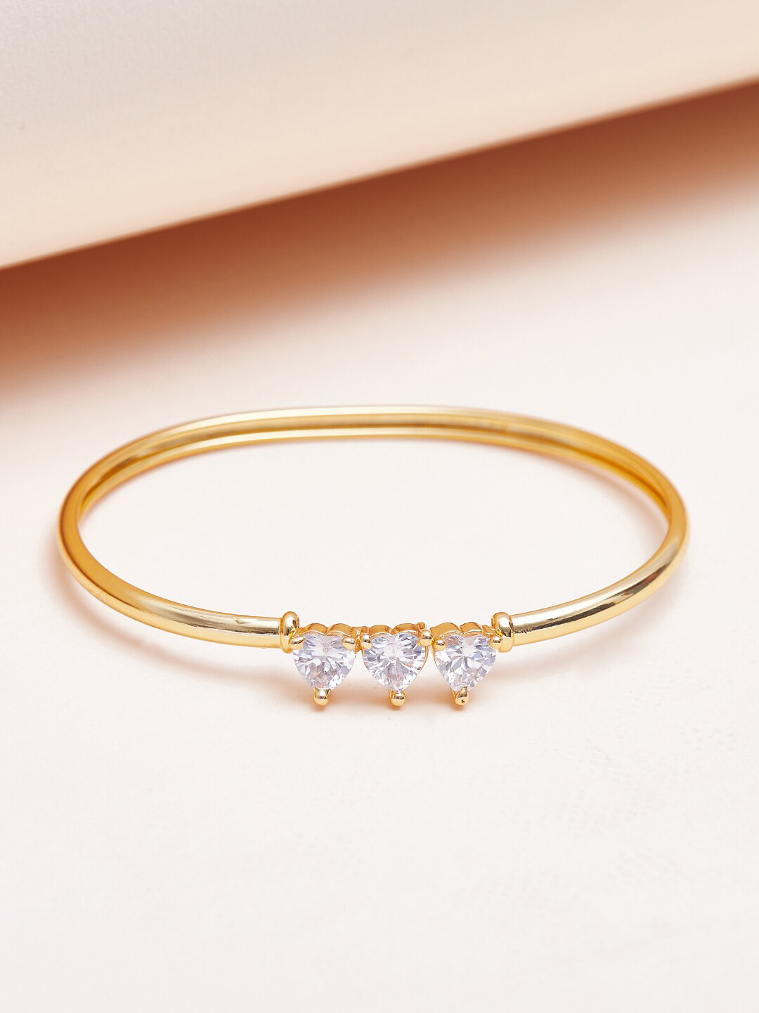 

Voylla Women Brass Cubic Zirconia Gold-Plated Bangle-Style Bracelet