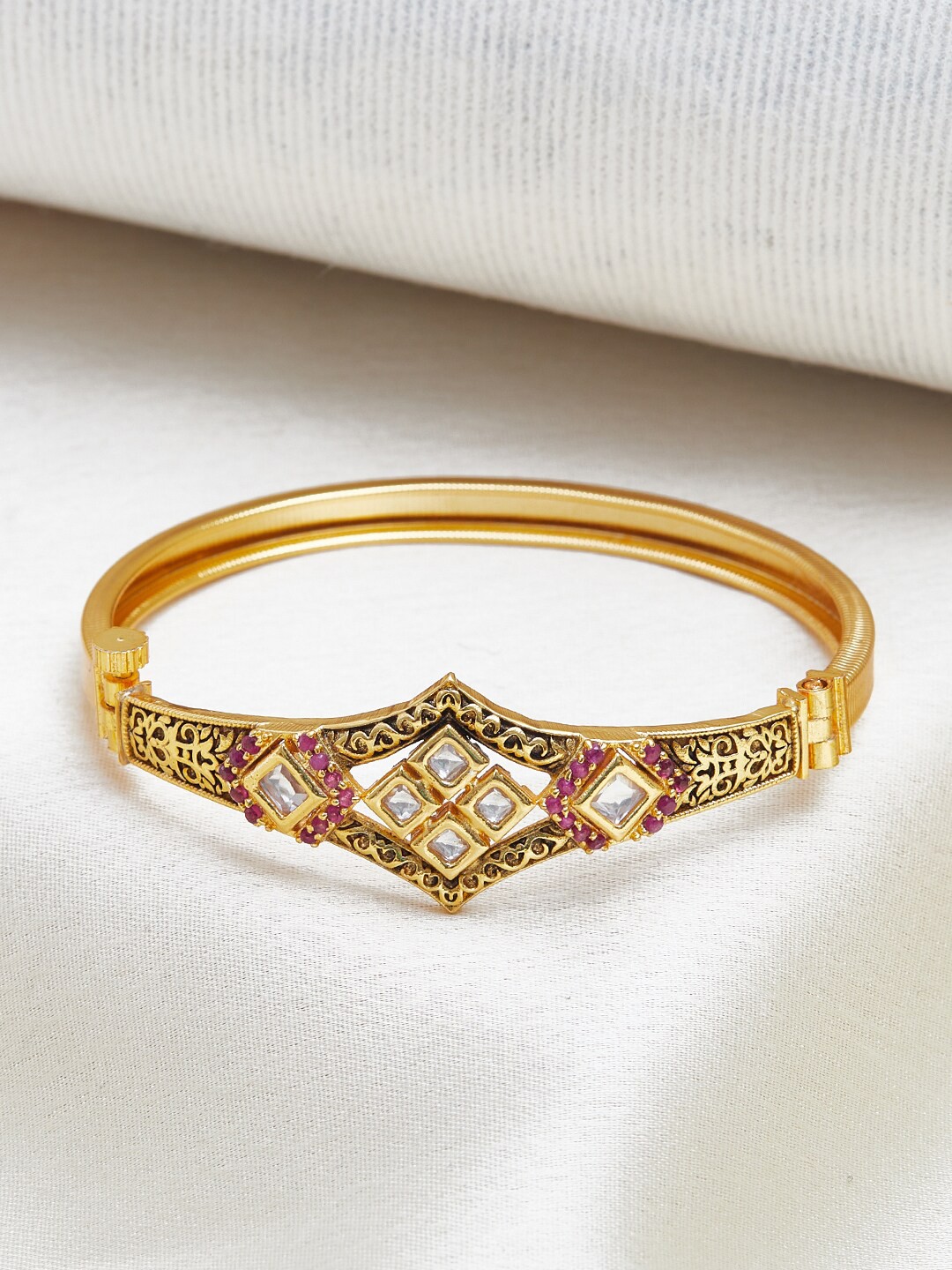 

Voylla Women Brass Cubic Zirconia Gold-Plated Bangle
