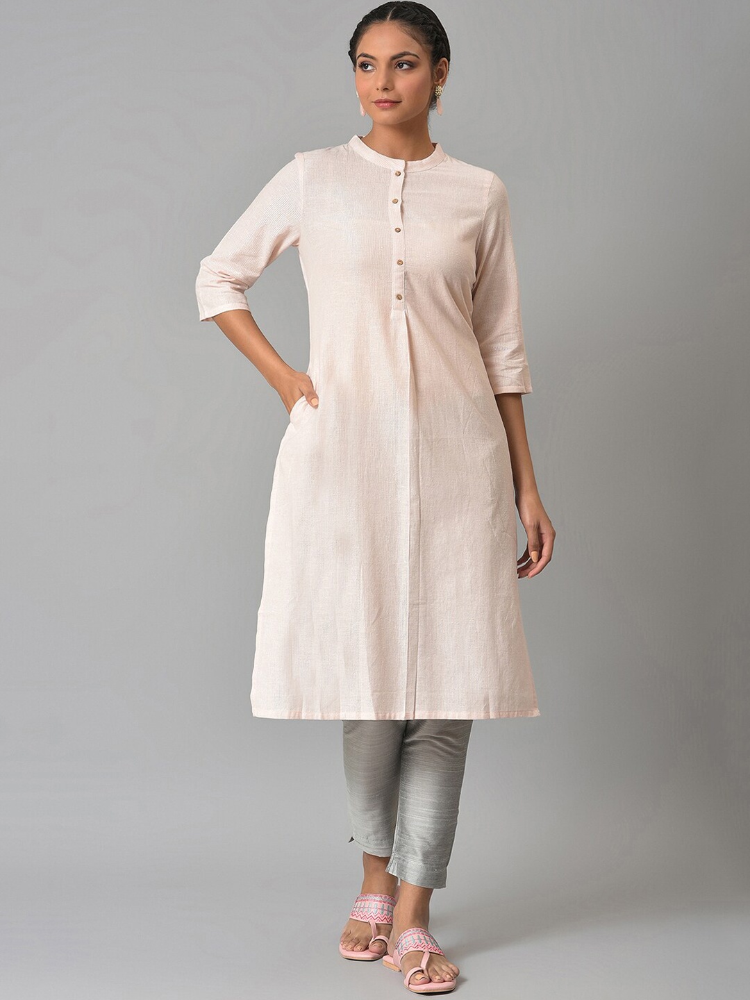 

W Women Pink Striped Kurta with Trousers